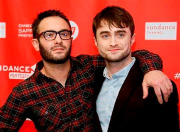 (Photo by Danny Moloshok/Invision/AP). Director John Krokidas, left, and actor Daniel Radcliffe pose at the premiere of "Kill Your Darlings" during the 2013 Sundance Film Festival on Friday, Jan. 18, 2013 in Park City, Utah.